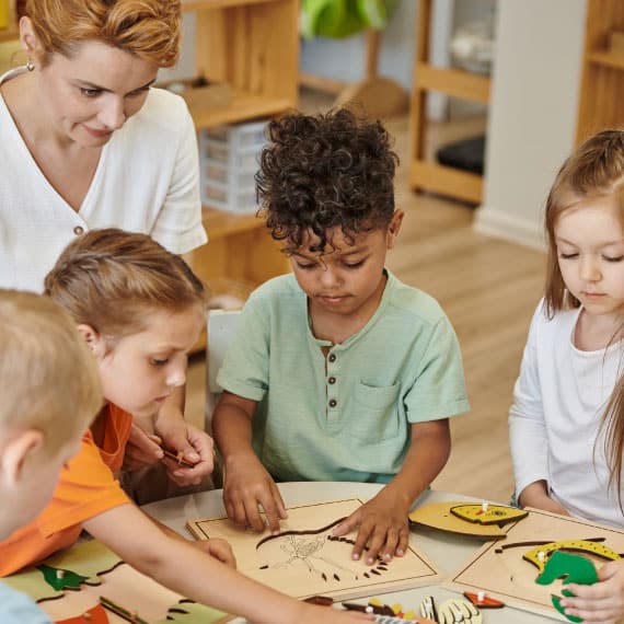 Group preschool doing puzzles